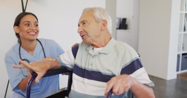 Animation Happy Biracial Female Doctor Taking Care Caucasian Senior Man — Αρχείο Βίντεο