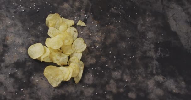 Close View Salt Potato Chips Copy Space Black Surface Food — Stockvideo