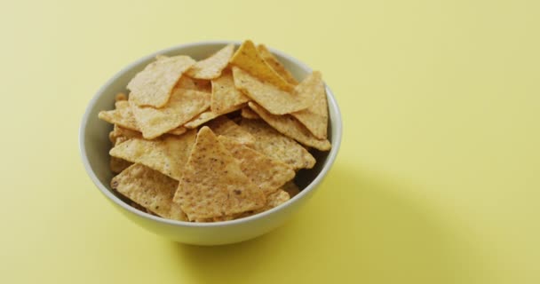 Close Nachos Bowl Copy Space Yellow Surface Food Snack Concept — Vídeo de Stock