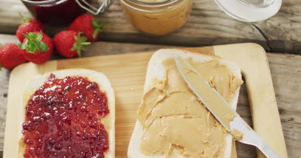 Peanut Butter Jelly Sandwiches Wooden Tray Milk Strawberries Wooden Surface — Vídeo de Stock