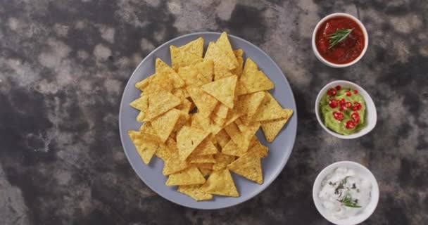 Close Nachos Plate Sauces Black Surface Food Snack Concept — Vídeos de Stock