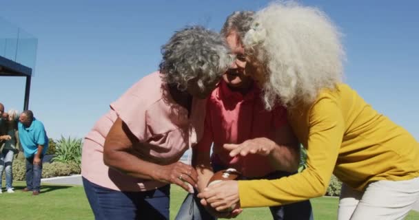 Happy Senior Diverse People Playing Rugby Garden Retirement Home Healthy — Stock videók