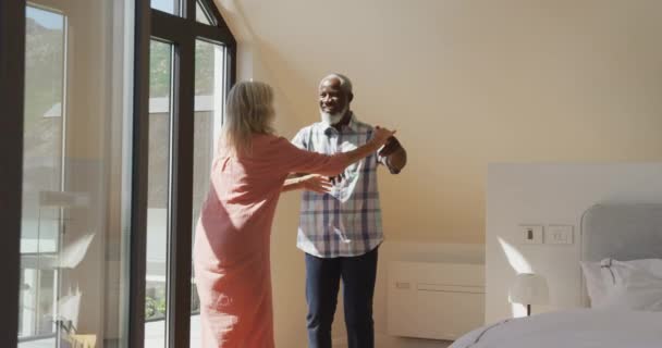 Happy Senior Diverse Couple Dancing Living Room Retirement Home Healthy — Stockvideo