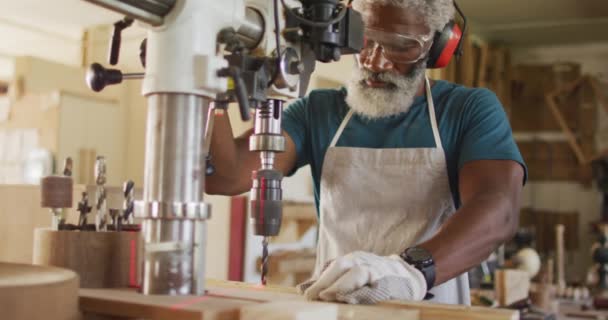 African American Male Carpenter Drilling Wood Laser Drill Carpentry Shop — стокове відео