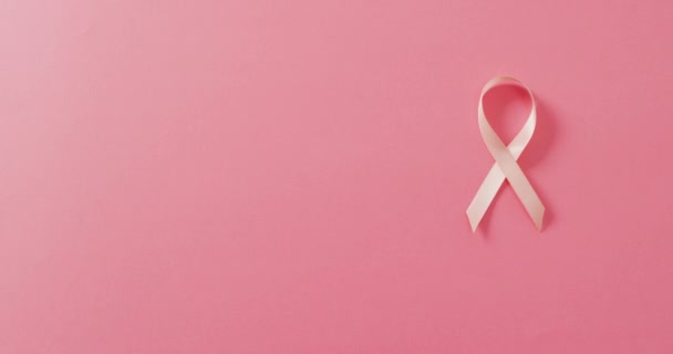 Video Nastro Rosa Pallido Cancro Seno Sfondo Rosa Campagna Sensibilizzazione — Video Stock