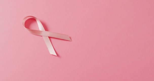 Vidéo Ruban Rose Cancer Sein Sur Fond Rose Pâle Symbole — Video