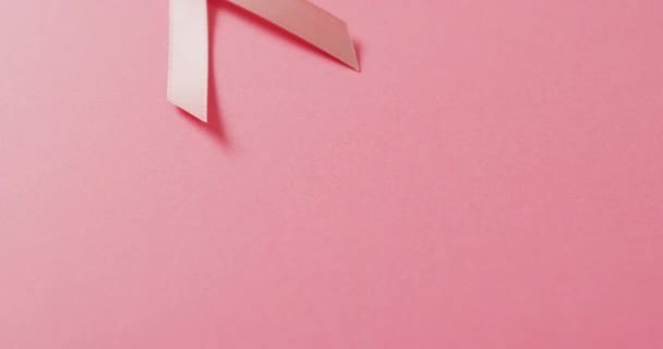 Video Nastro Rosa Del Cancro Seno Sfondo Rosa Pallido Campagna — Video Stock