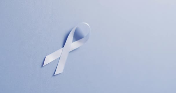 Video Pale Blue Prostate Cancer Ribbon Pale Blue Background Medical — Stockvideo