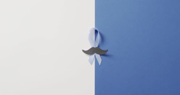 Video Paper Moustache Pale Blue Prostate Cancer Ribbon White Blue — Stock video