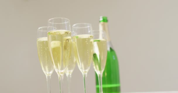 Video Champagne Glasses Bottle Beige Background Alcohol Beverage Drinks Party — Stock Video