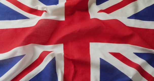 Wideo Pogniecioną Flagą Wielkiej Brytanii Leżącej Białym Tle Narodowość Symbole — Wideo stockowe