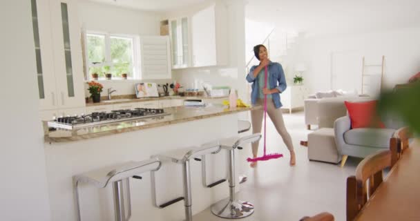 Video Happy Biracial Woman Moping Floors Dancing Singing Lifestyle Household — Αρχείο Βίντεο