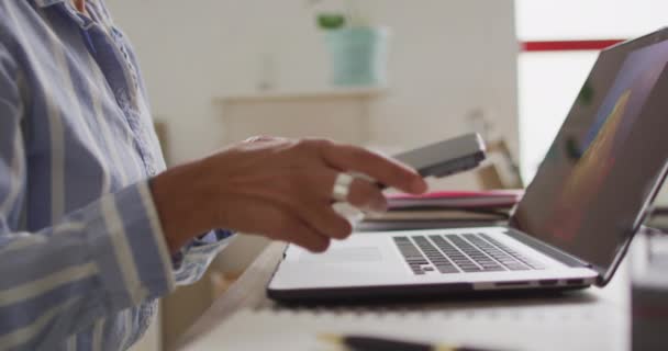 Video Midsection Biracial Female Designer Working Laptop Studio Art Crafts — Vídeos de Stock