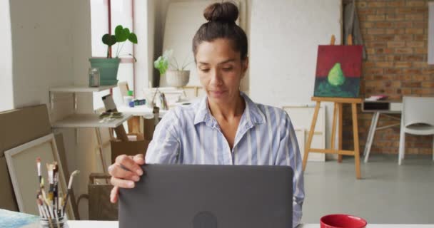 Video Happy Biracial Female Designer Using Laptop Studio Art Crafts — Vídeo de stock