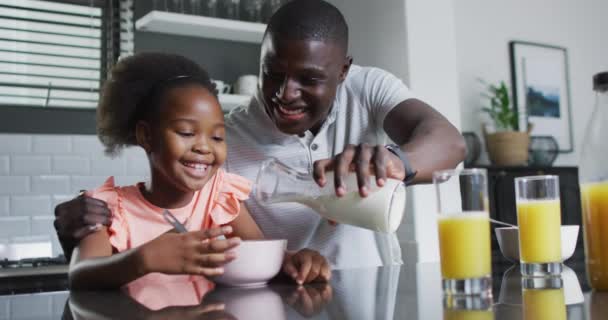 African American Father Daughter Eating Breakfast Enjoying Quality Family Time — Stockvideo