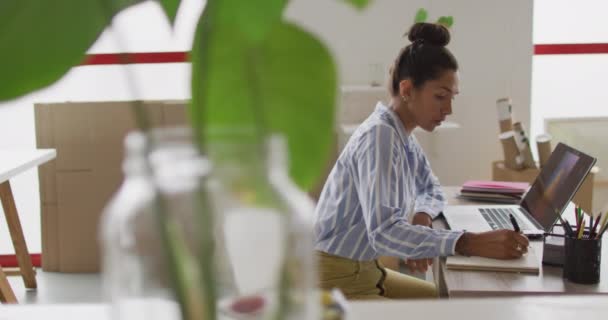 Video Biracial Female Designer Working Laptop Studio Art Crafts Creativity — Stockvideo
