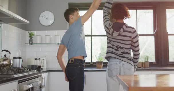 Happy Diverse Male Couple Smiling Dancing Together Kitchen Spending Quality — ストック動画