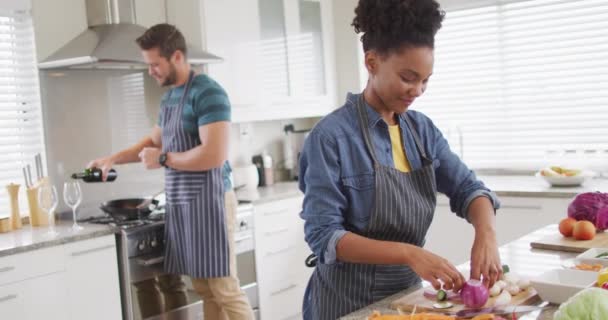 Video Happy Diverse Couple Preparing Meal Cutting Vegetables Kitchen Love — Wideo stockowe