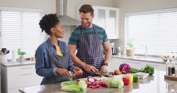 Video Happy Diverse Couple Preparing Meal Cutting Vegetables Kitchen Love — 图库视频影像