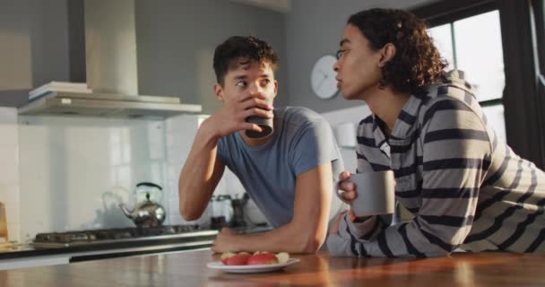 Happy Diverse Male Couple Drinking Coffee Talking Kitchen Spending Quality — Video Stock