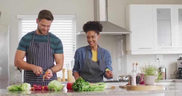 Video Happy Diverse Couple Preparing Meal Cutting Vegetables Kitchen Love — Vídeos de Stock