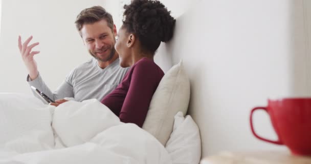 Video Happy Diverse Couple Using Tablet Bed Talking Love Relationship — Vídeo de stock