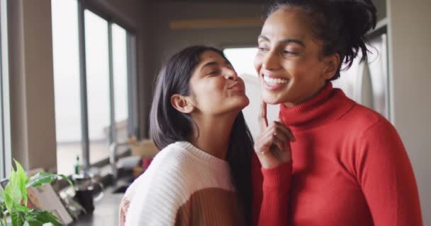 Video Happy Biracial Female Friends Kissing Cheek Friendship Having Fun — Stockvideo