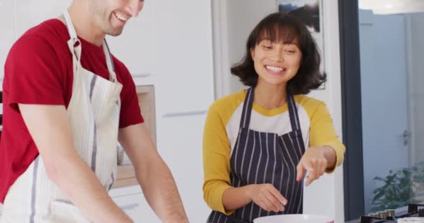 Video Happy Diverse Couple Baking Together Kitchen Love Relationship Spending — Vídeos de Stock