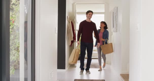 Video Happy Diverse Couple Returning Home Shopping Bags Love Relationship — Stock videók