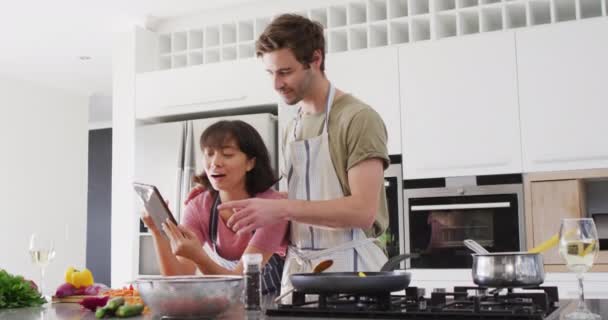 Video Happy Diverse Couple Preparing Meal Together Tablet Love Relationship — Vídeo de stock