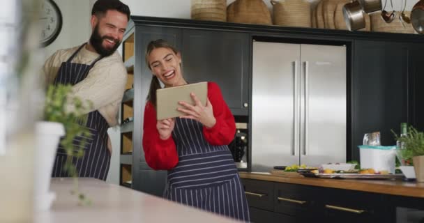 Video Happy Caucasian Couple Using Tablet Kitchen Domestic Lifestyle Leisure — Vídeo de Stock