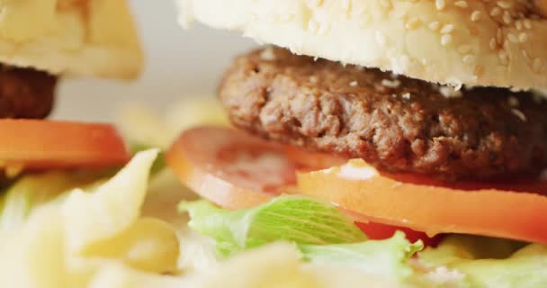 Video Close Two Hamburgers Salad Burger Buns Tasty Hot Homemade — Stockvideo