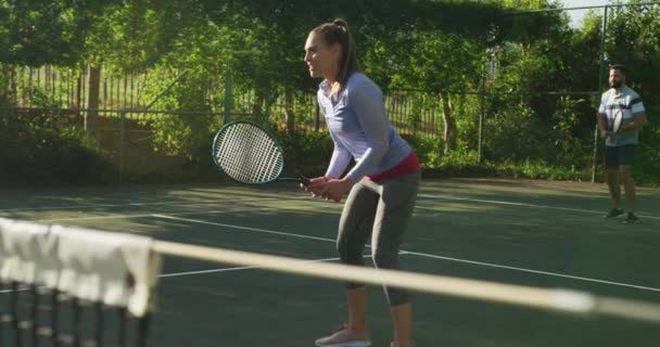 Video Happy Caucasian Couple Playing Tennis Court Healthy Active Lifestyle — Stockvideo