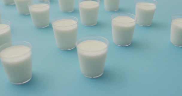 Video Row Glasses Milk Blue Background Dairy Products Healthy Organic — Stok Video