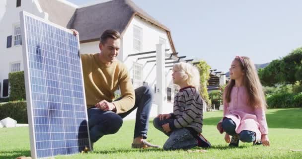 Video Happy Caucasian Father Explaining Solar Panel Son Daughter Sunny — Video