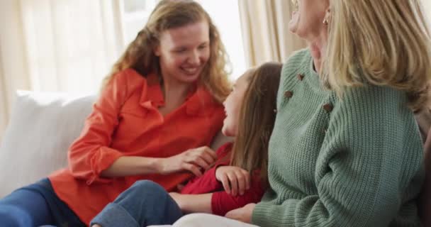 Video Happy Caucasian Daughter Tickled Mother Grandmother Sitting Couch Family — Stock videók