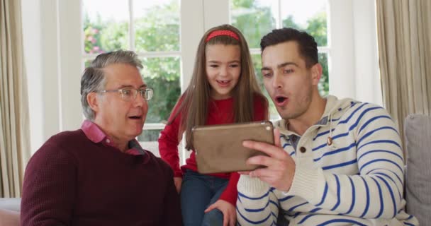 Video Happy Caucasian Father Grandfather Granddaughter Sitting Couch Looking Tablet — Video