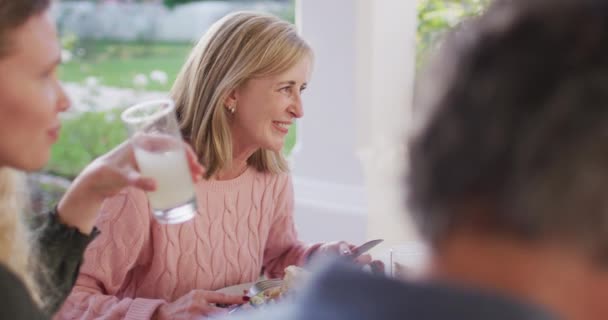 Video Happy Caucasian Parents Daughter Grandparents Eating Outdoor Dinner Table — стоковое видео