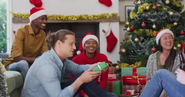 Happy Diverse Group Friends Sharing Presents Christmas Time Christmas Festivities — Stock Video