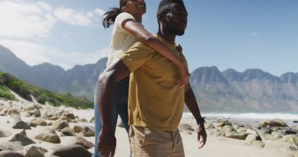 African American Man Giving Piggyback Ride His Wife Beach Nature — Stock Video