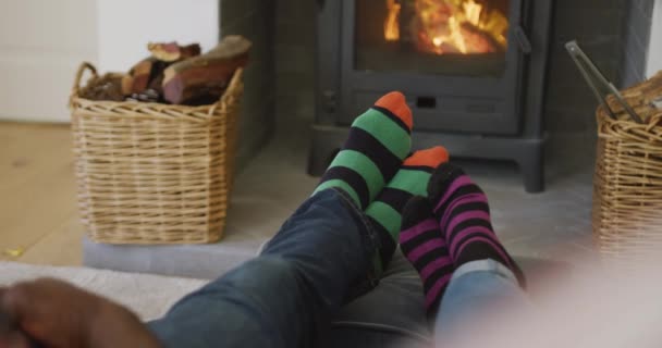 Happy African American Senior Couple Wearing Stripes Socks Sitting Floor — Stock Video