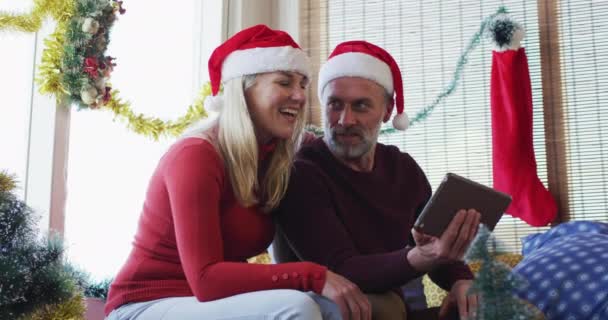 Happy Caucasian Mature Couple Making Video Call Room Full Christmas — Stock Video