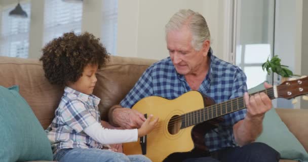 Video Biracial Grandson Caucasian Grandfather Playing Guitar Together Family Life — Stock Video