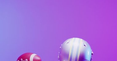 Afro-Amerikan Amerikan futbolcunun mor neon üzerine top oynadığı bir video. Amerikan futbolu, spor ve yarışma konsepti.