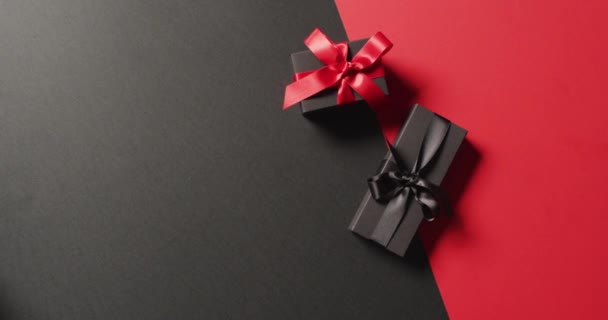 Overhead View Two Black Gift Boxes Red Black Ribbons Black — Stock Video