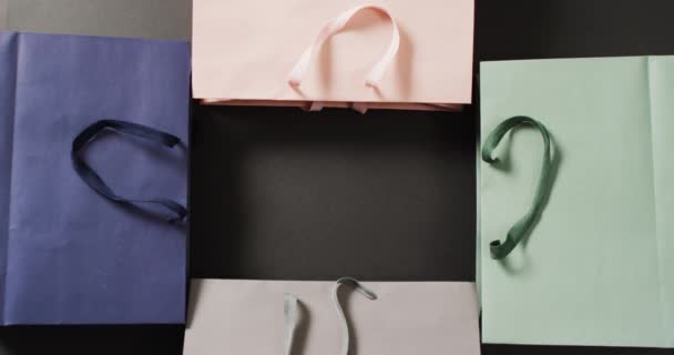 Bolsas Regalo Color Pastel Con Espacio Central Para Copias Negro — Vídeos de Stock
