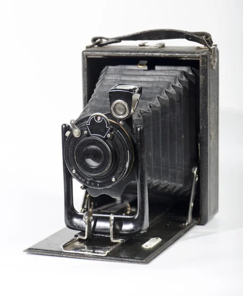 Beyaz izole vintage ve retro kamera (yan görünümü)