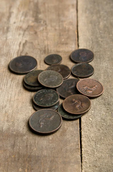 English Victorian pennies on the wooden table — Stock Photo, Image