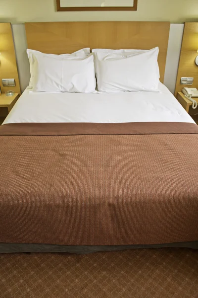 Hotel bed — Stock Photo, Image