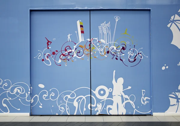 Blue door with decoration — Stock Photo, Image